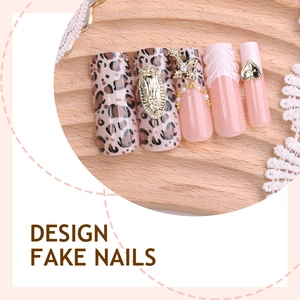 Handmade press-on nails with French leopard print and golden religious relief charms
