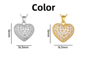 Detailed size comparison of gold and silver heart pendants with cubic zirconia 16.5mm