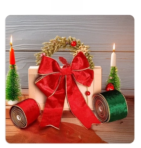 Close-up of red and green velvet ribbons with gold edges for Christmas gift wrapping