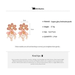 Detailed view of pink floral earrings with glass petals and freshwater pearls dimensions