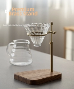 Detailed close-up of a premium brass adjustable stand with a wooden base for coffee pour-over