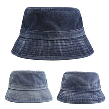 Close-up of three shades of vintage washed denim bucket hats in blue color variants