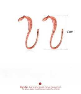 Detailed view of rose gold cobra snake earrings with dimensions and 23g weight specs