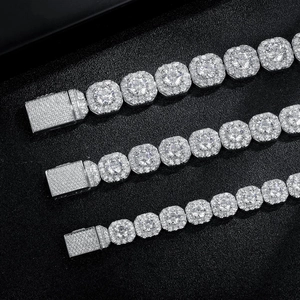 Macro shot of three luxury hip-hop tennis bracelets with silver finish and cubic zirconia