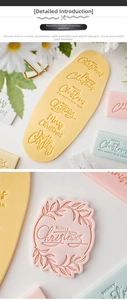 Macro view of Merry Christmas embossed fondant cookie stamps in pastel colors for baking