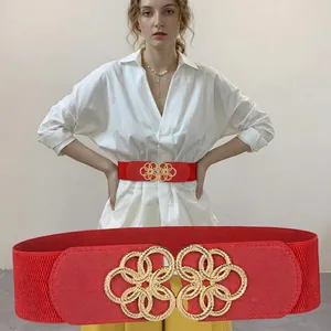 Women red elastic wide waist belt with golden flower buckle for dresses and coats