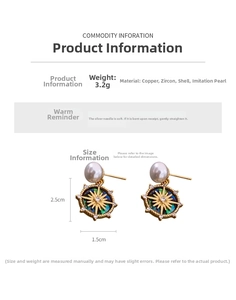 Detail view of 18k gold plated starburst earrings showing dimensions 2.5cm by 1.5cm