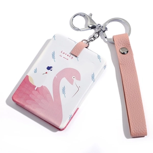 Detail of pink flamingo keychain with PU leather card holder and metallic lobster clasp