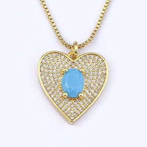 Elegant gold-plated necklace featuring a blue heart pendant with pavé cubic zirconia