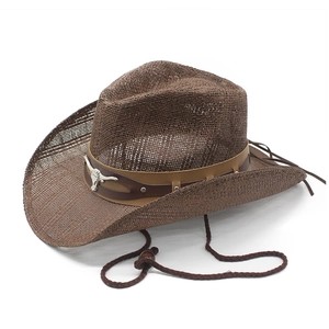 Detail of dark brown cowboy straw hat featuring a metal bull skull buckle and leather band