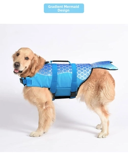 Detail of mermaid dog life jacket with blue fish scale pattern and durable rescue handle