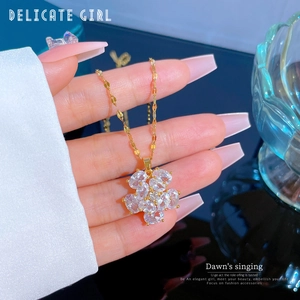 Titanium steel gold flower pendant necklace with clear zircon stones for women