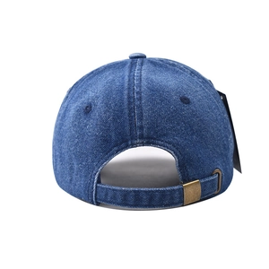 Close-up of washed denim baseball cap back with adjustable bronze metal buckle strap