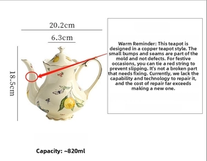 French vintage ceramic teapot with lemon and butterfly patterns and 820ml capacity