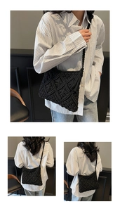 Detail of black macrame crossbody bag showing geometric knit texture and fringe tassels