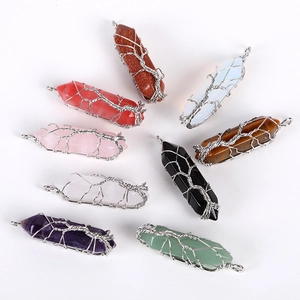 Eight natural hexagonal crystal pendants with silver metal wire wrapped Tree of Life design