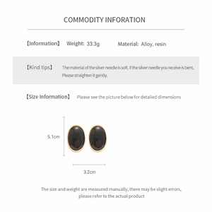 Detailed view of oval resin earrings with silver needles showing 5.1cm height and 3.2cm width