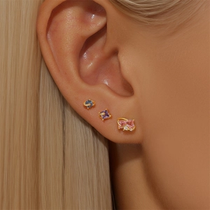 Detail of S925 sterling silver ear studs with blue, purple, and pink colorful zircons