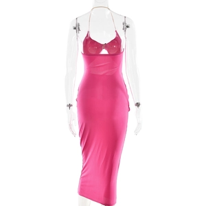 Detail view of the back cutout and halter neck ties on this pink slim fit midi dress