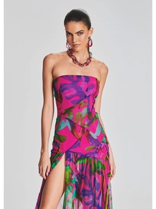 Detail of tropical floral print strapless maxi dress with high slit and chiffon texture