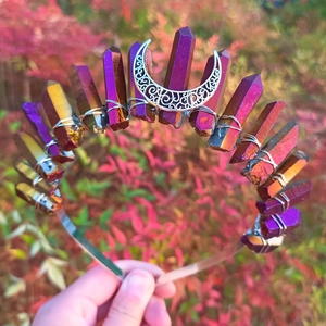 Handmade rainbow crystal moon crown headband with silver crescent on a metal base