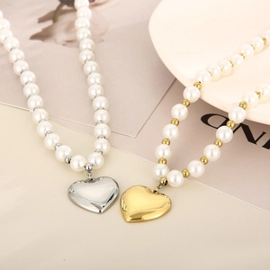 Bracelet de perles vintage français avec pendentifs en cœur or et argent élégant