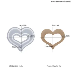 Dettaglio stampo in silicone a cuore e colata di resina con misure dimensionali