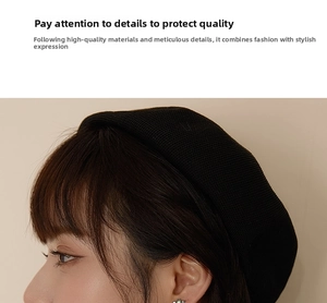 Detail view of high-density black knit beret with soft texture for autumn and winter