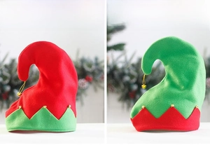 Detail showing red and green felt elf hats with jagged trim and golden bells for Christmas