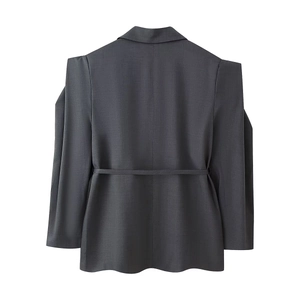 Back view of dark grey blazer featuring structured padded shoulders and slim waist belt detail