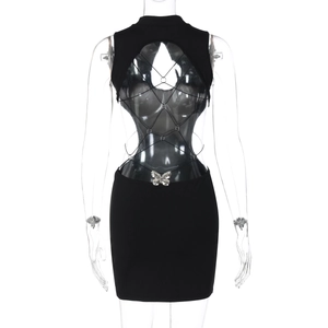Detailed back view of sexy cutout dress with butterfly metal buckle and mesh panels