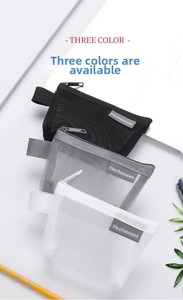 Detailed view of mesh nylon zipper pouches in black, grey, and white with logo