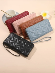 Women's long faux leather wallet with heart embroidery and multi-color zipper design
