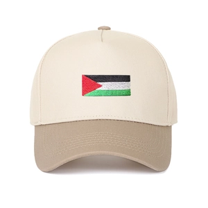 Detailed embroidery of the Palestine flag on a two-tone beige and khaki baseball cap