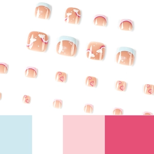 Blue and pink gradient press-on toe nails with cute rainbow cloud and heart designs