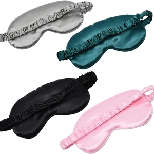 Silky satin sleep masks in silver, green, black and pink with elastic headbands