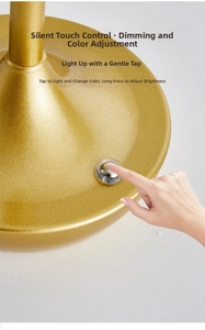 Detail of golden metal lamp base featuring silent touch control for dimming and color modes