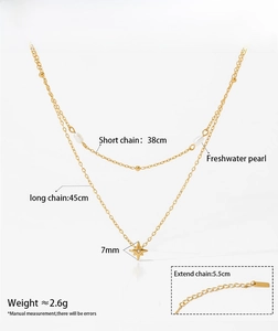 Detail of layered gold stainless steel necklace with dimensions and pearl star elements