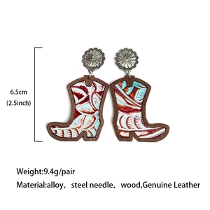 Western cowboy boot earrings featuring leopard print leather and wooden texture detail