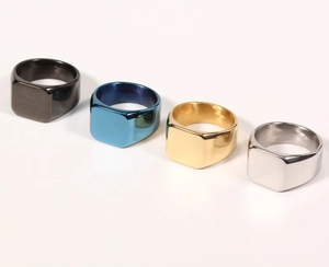 Polished stainless steel signet rings for men in black, blue, gold and silver finishes