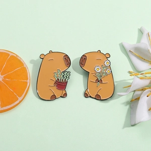 Cute capybara enamel pin set featuring floral and potted plant designs in brown metal