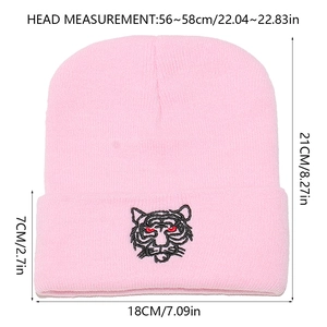 Pink knitted beanie detailed sizing view with tiger head embroidery measurements