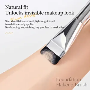Flat top foundation brush with silver handle for thin and seamless makeup application