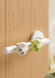 Detailed view of silicone door handle bumpers in mushroom shape for wall protection