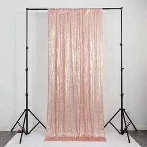 Pink sequin background cloth for wedding parties on black photography backdrop stand