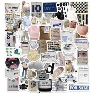 Flat lay of vintage style waterproof decorative stickers with collage aesthetic