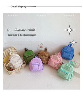 Flat lay of colorful lightweight children backpacks in seven soft macaron colors