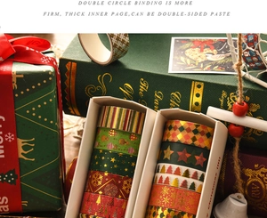 Detail of Christmas washi tape with gold foil patterns and festive gift packaging boxes