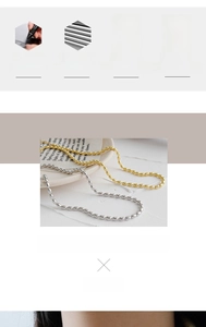 Detailed view of fashionable 18K gold and silver titanium steel oval bead necklaces