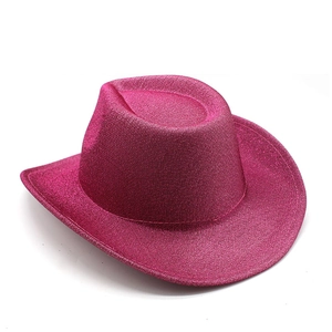 Detail of hot pink western cowboy hat with sparkling glitter texture and stitched brim
